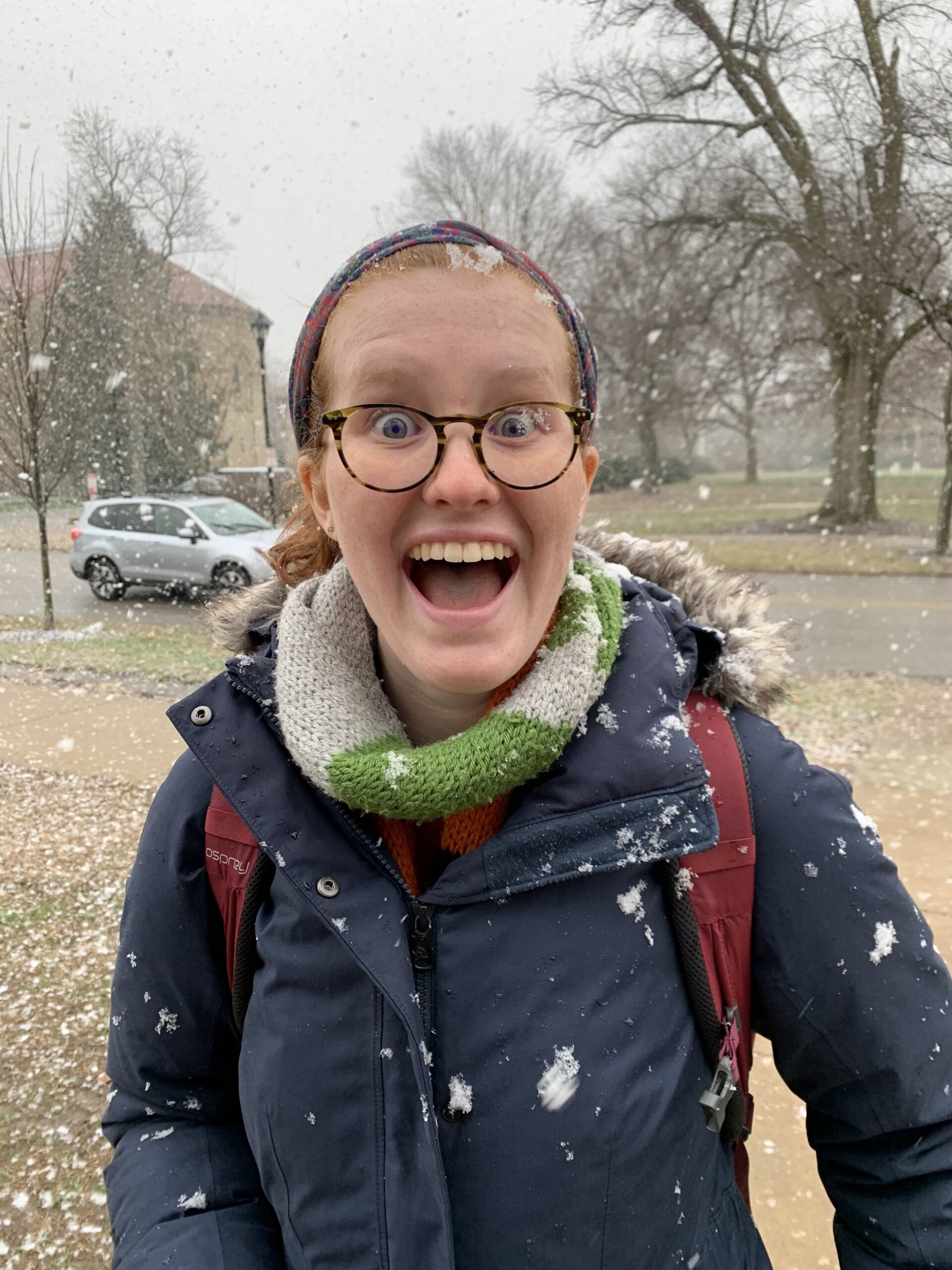 Person smiling in the snow